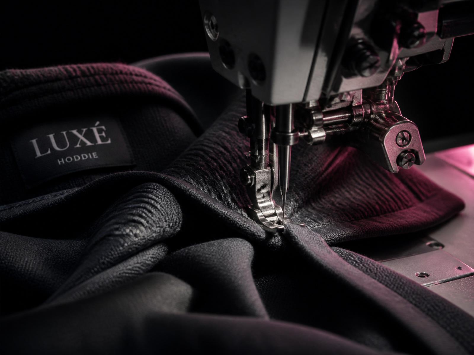 Industrial sewing machine stitching heavyweight hoodie fabric